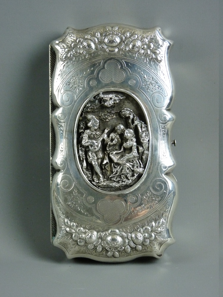 A CONTINENTAL WHITE METAL CIGAR CASE, circa 1900, the shaped edge rectangular case with bright cut