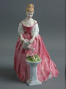 A ROYAL DOULTON PORCELAIN FIGURINE titled 'Alexandra' HN3292, 20 cms high