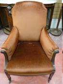 AN EDWARDIAN MAHOGANY FRAMED ARMCHAIR with scroll end arms and beaded decoration on tapering