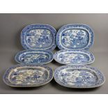 SIX WILLOW PATTERN SERVING PLATTERS, 40 cms wide approximately