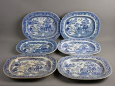 SIX WILLOW PATTERN SERVING PLATTERS, 40 cms wide approximately