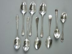 A SET OF SIX SILVER TEASPOONS by Walker & Hall with three others, the set with scrolled decorated