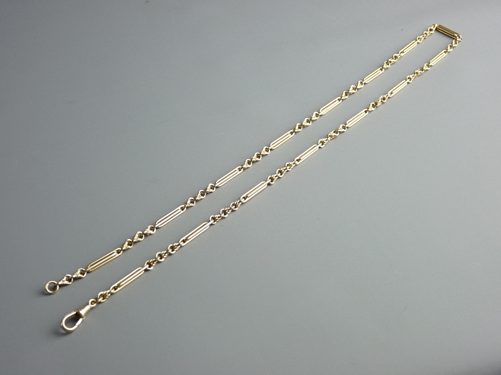 A NINE CARAT GOLD BAR & LINK FOB CHAIN, 66 cms long, 38 grms approximately