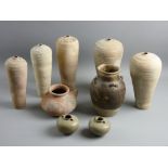 NINE ITEMS OF SONG DYNASTY POTTERY - two pairs plus one of unglazed narrow necked vases, an unglazed