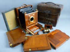 AN EXCELLENT MAHOGANY HALF PLATE FIELD CAMERA KIT by S & J Mitchell, circa 1890, complete with lens,