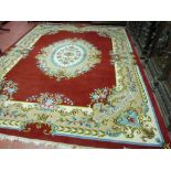 AN EXCELLENT LARGE HAND KNOTTED WOOLLEN CARPET, probably Indian with a central floral pattern