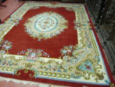 AN EXCELLENT LARGE HAND KNOTTED WOOLLEN CARPET, probably Indian with a central floral pattern