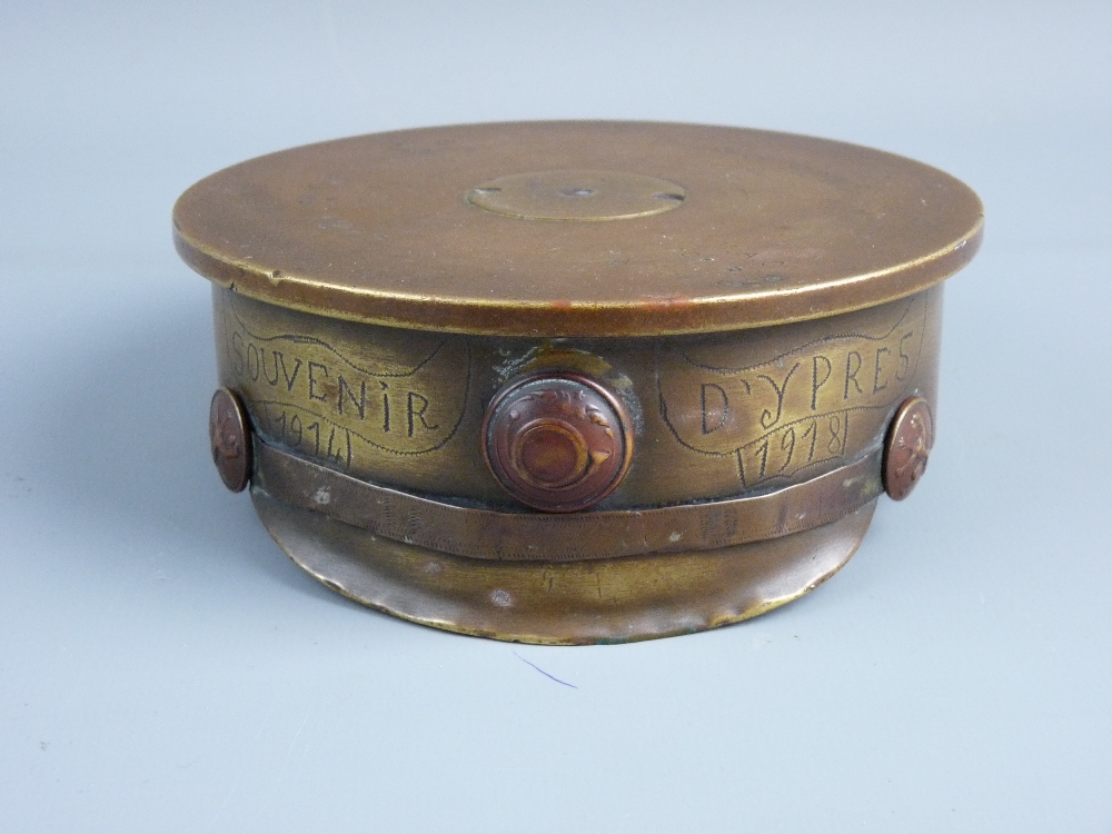 WWI TRENCH ART HOWITZER SHELL CASE BASE in the form of a cap, usual base markings dated 1917, the