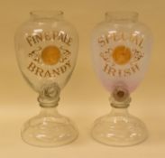 A PAIR OF ANTIQUE GLASS PUBLIC HOUSE JARS & A PAIR OF POTTERY ADVERTISING KEGS the glass jars with