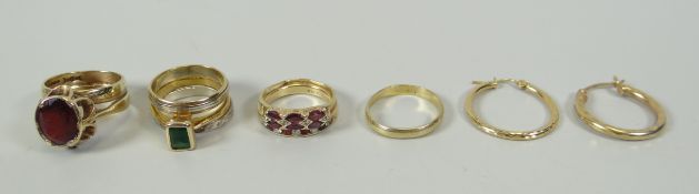 A PARCEL OF RINGS including three 14k, 15gms, one 9ct and a pair of 14k hoop earrings