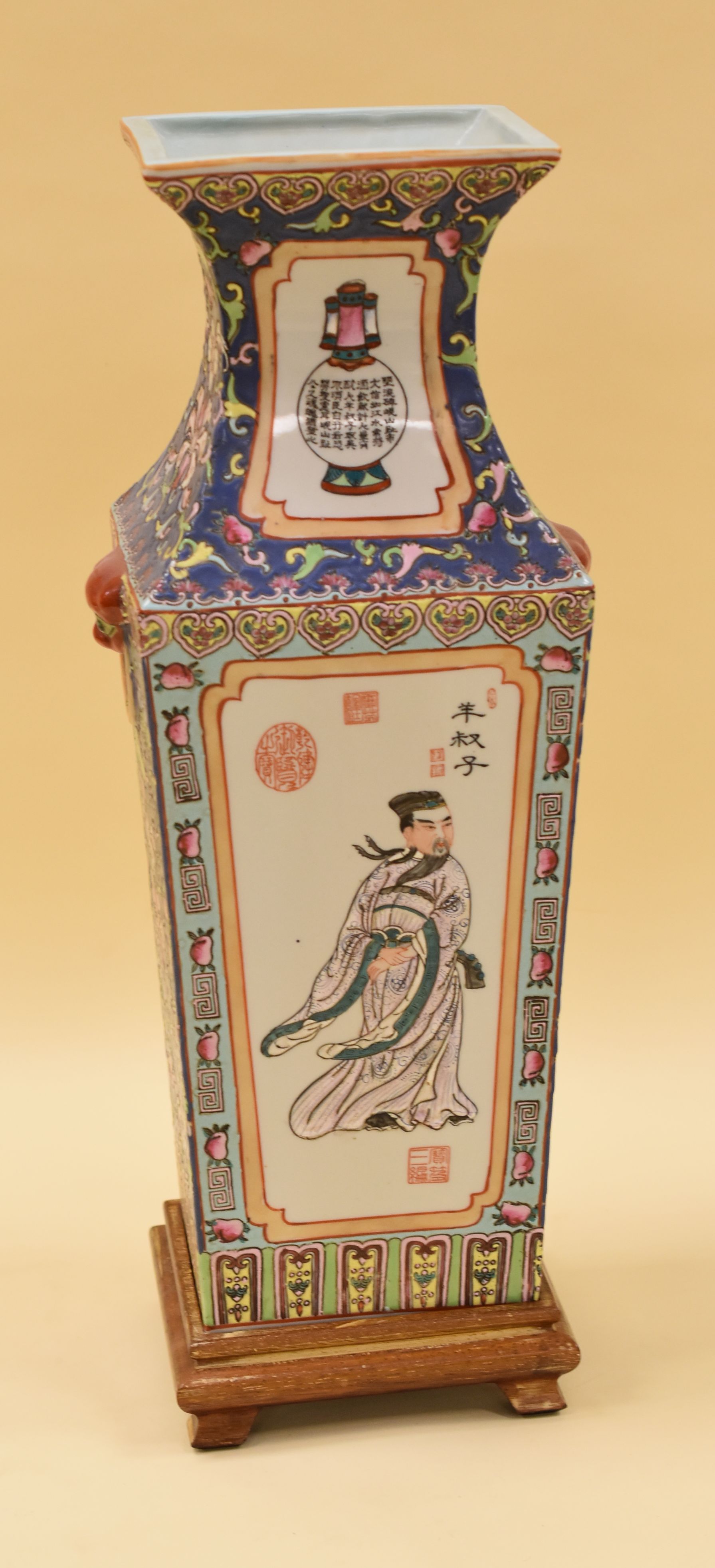 A TWENTIETH CENTURY JAPANESE VASE having a square base, the body tapering to a shaped neck and