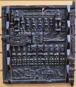 A PRE-TOURIST CONGOLESE CARVED WOODEN DOOR PANEL, 43 x 42cms