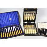 A PARCEL OF CASED CUTLERY including two cased sets of six silver coffee-bean spoons, a cased set