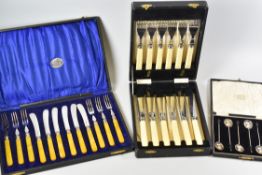 A PARCEL OF CASED CUTLERY including two cased sets of six silver coffee-bean spoons, a cased set