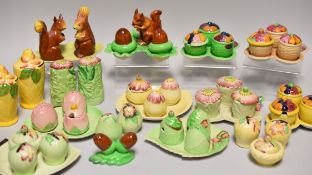 A PARCEL OF NOVELTY CARLTONWARE CRUET SETS of naturalist form including two novelty squirrel