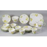 A TWENTY-ONE PIECE SHELLEY 'PRIMROSE' TEA-SET