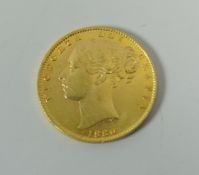 A SHIELD BACK GOLD SOVEREIGN, dated 1880