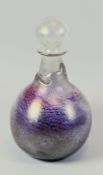 A PETER TYSOE ART GLASS DECANTER with stopper, having a mottled glass effect body and torn effect