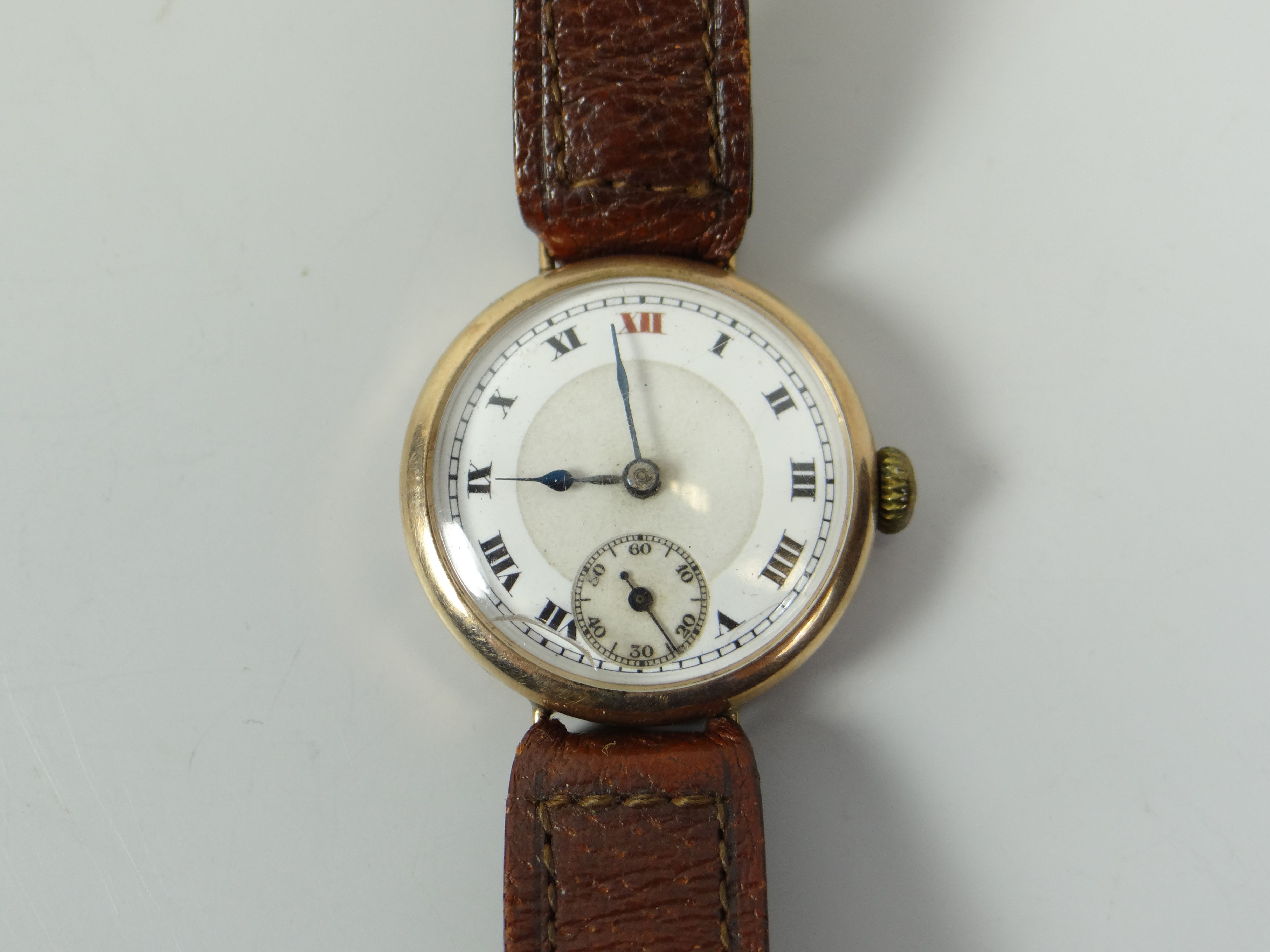 A VINTAGE 9CT GOLD ENCASED WRISTWATCH on later tan leather strap, the dial with Roman numerals and - Image 2 of 2