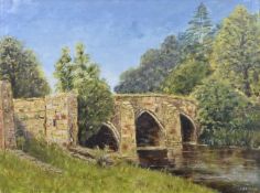 J A NORRIS oil on board - stone bridge over river with trees, entitled verso 'Cromford Bridge',