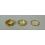 THREE 22CT YELLOW GOLD WEDDING BANDS, 12gms