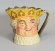 A RARE ROYAL DOULTON 'OLD KING COLE' MUSICAL JUG wearing yellow crown, Rd. No. 832354