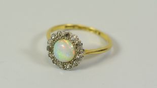 AN 18CT YELLOW GOLD & PLATINUM FLORAL OPAL RING, 2.1gms