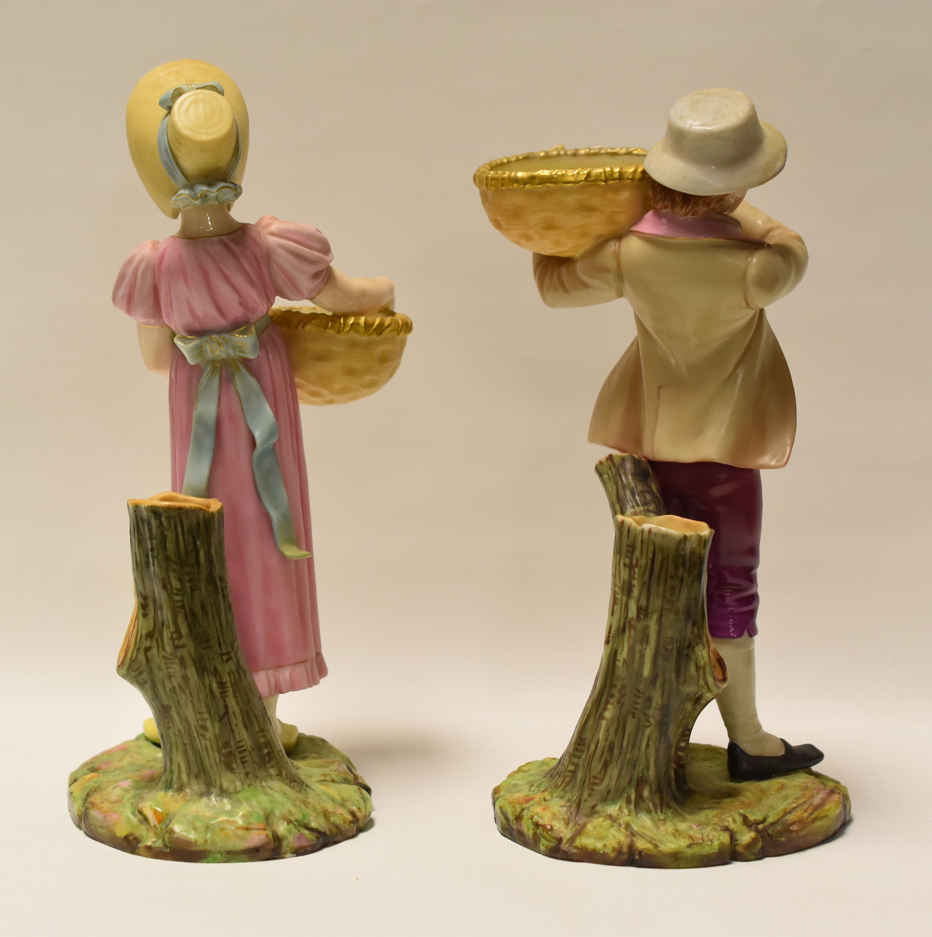 A PAIR OF ROYAL WORCESTER FIGURINE SPILL-HOLDERS of a male and female in pastel glazes and both - Image 2 of 2