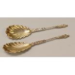 A PAIR OF SHELL BOWL SPOONS in the medieval style with twist stems and apostle terminals, London