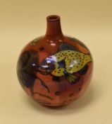 A TWENTIETH CENTURY LUSTRE FISH DECORATED VASE onion shaped with narrow bottle neck, orange and