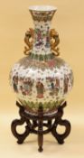 A TWENTIETH CENTURY JAPANESE ONION SHAPED VASE with all round decoration to white ground and with
