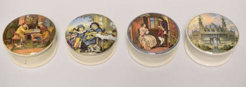 FOUR PRATT WARE POT LIDS with bases and titled as 'A PAIR', 'PARIS EXHIBITION 1878', 'YOUTH & AGE'