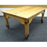 AN UNUSUAL LATE TWENTIETH CENTURY PINE DINING TABLE from reclaimed pine and with iron fittings and