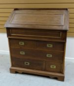 A CONTINENTAL OAK CAMPAIGN-STYLE BUREAU the base with a bank of four drawers and a hinged