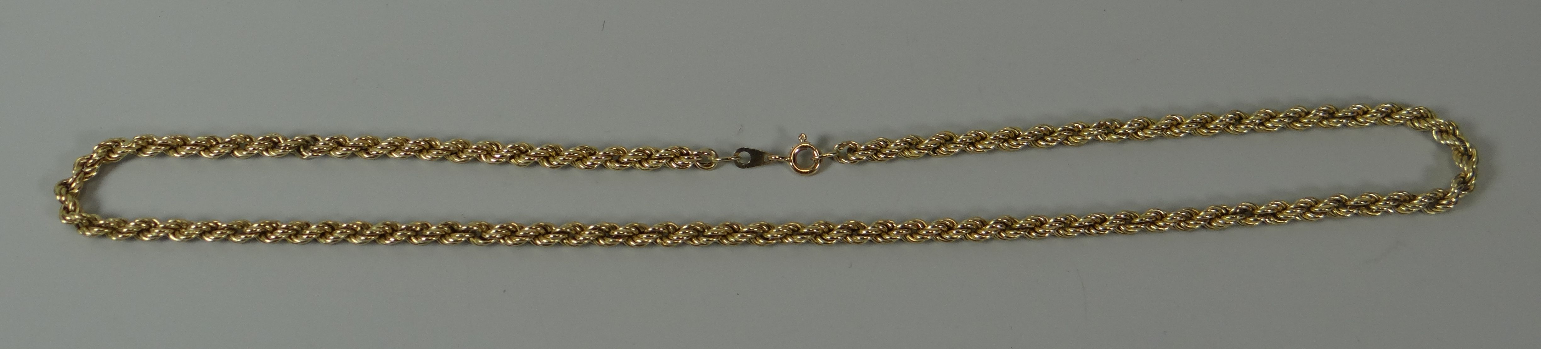 A LONG 9CT YELLOW GOLD ROPE-TWIST NECKLACE, 9.8gms