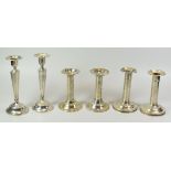 THREE PAIRS OF AMERICAN SILVER CANDLESTICK HOLDERS comprising a pair of plain circular footed column