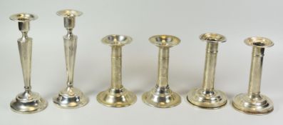 THREE PAIRS OF AMERICAN SILVER CANDLESTICK HOLDERS comprising a pair of plain circular footed column