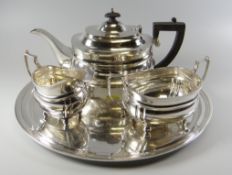 A FOUR PIECE SILVER TEASET FOR TIFFANY comprising teapot, sugar basin, cream jug and circular