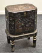 A MOTHER OF PEARL INLAID LACQUER-WARE STORAGE TABLE circa 1880-1900 Provenance: great-great uncle