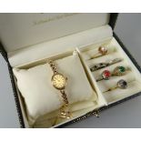 A 9CT GOLD LADIES 'SOVEREIGN' BRACELET WATCH & SIX LADIES RINGS, the watch with matching box and