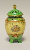 A CARLTONWARE 'MANDARIN TREE' POT-POURRI VASE & COVER of ovoid form on four feet and decorated to