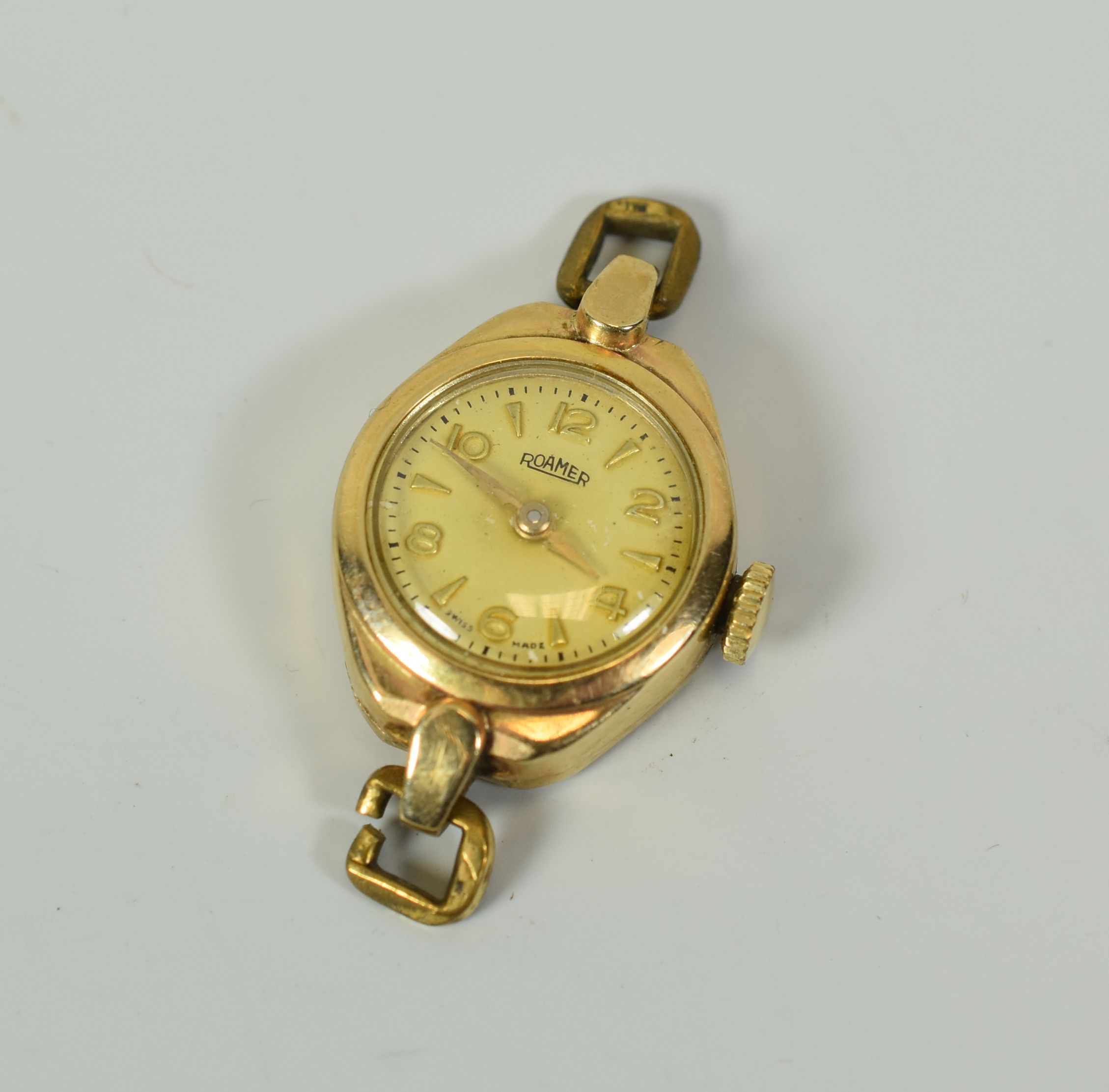 A 9CT GOLD ROAMER WRISTWATCH (no strap)