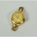 A 9CT GOLD ROAMER WRISTWATCH (no strap)