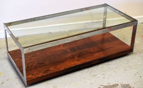 A DANISH-STYLE ROSEWOOD CHROME & GLASS LONG JOHN COFFEE TABLE of two tiers, 122 x 57cms