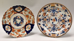 A CHINESE EXPORT CHARGER decorated in the Imari palette, 33cms diam, and an Imari charger with