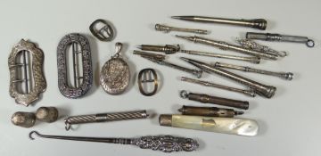 A MIXED PARCEL OF SMALL SILVER ITEMS including belt-buckles and approx eleven pencils