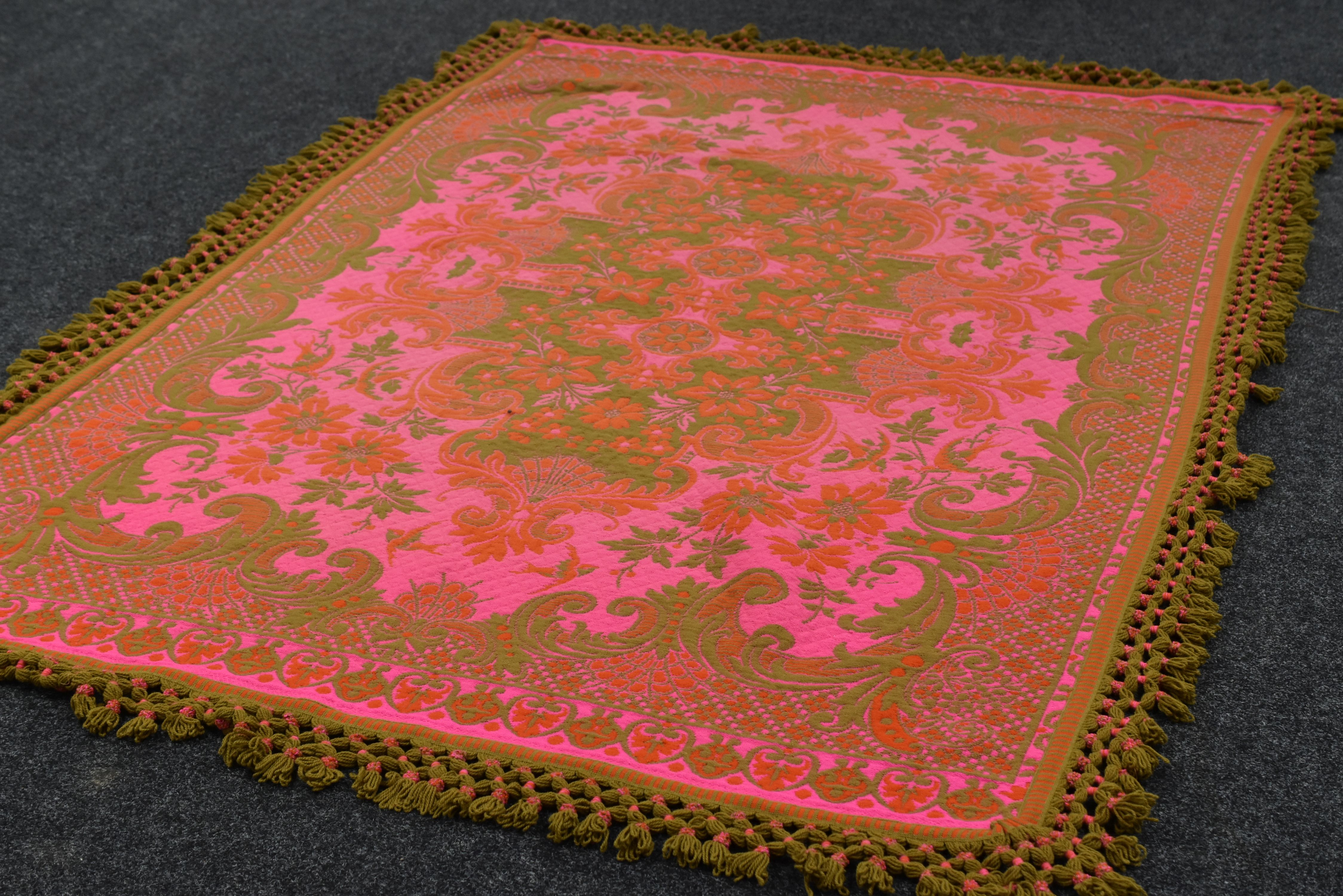 A SPANISH 'CASA PUPO' WOOL BLANKET in bright pink and green, 302 x 185cms