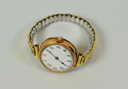 A VINTAGE 9CT GOLD ENCASED WRISTWATCH on expanding bracelet