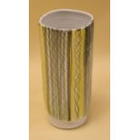 A RYE CINQUE PORTS CYLINDRICAL VASE of ribbed form and with grey and yellow linear decoration,
