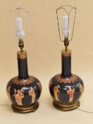 A PAIR OF MODERN ORIENTAL ENAMELLED TABLE LAMPS onion shaped and with shades on metallic stands